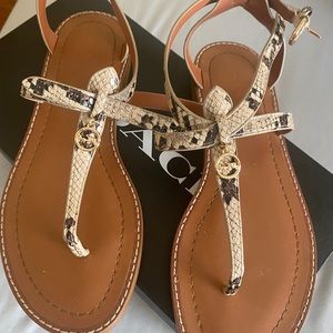 Coach, Sandler size 6 1/2. Snake skin pattern. Only worn a hand full of times.